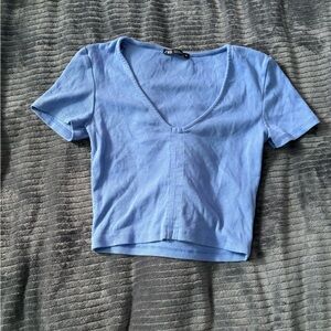 Blue zara kinda crop top I lost the sting that went on the middle